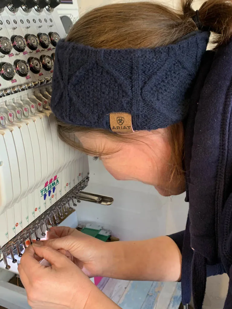 Donna working at machine
